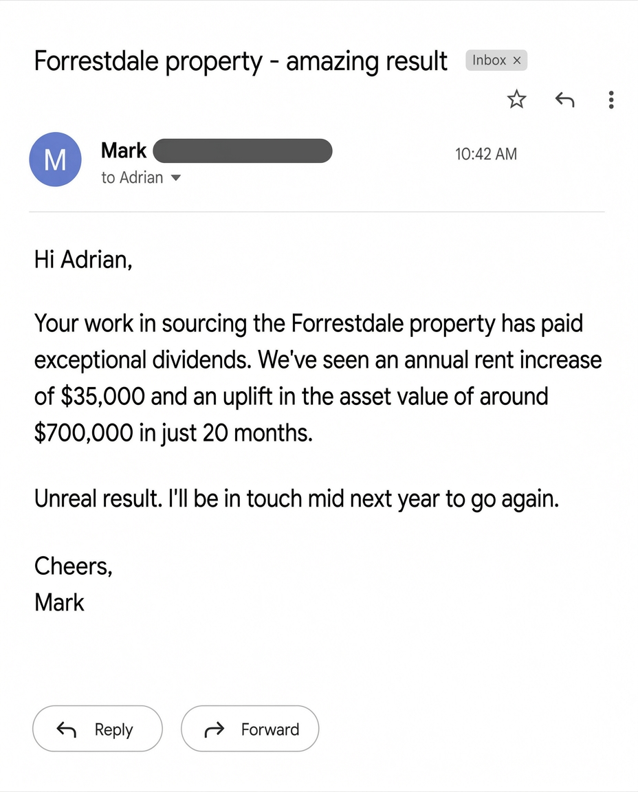 Client email reporting a $35k annual rent increase and $700k value uplift in 20 months